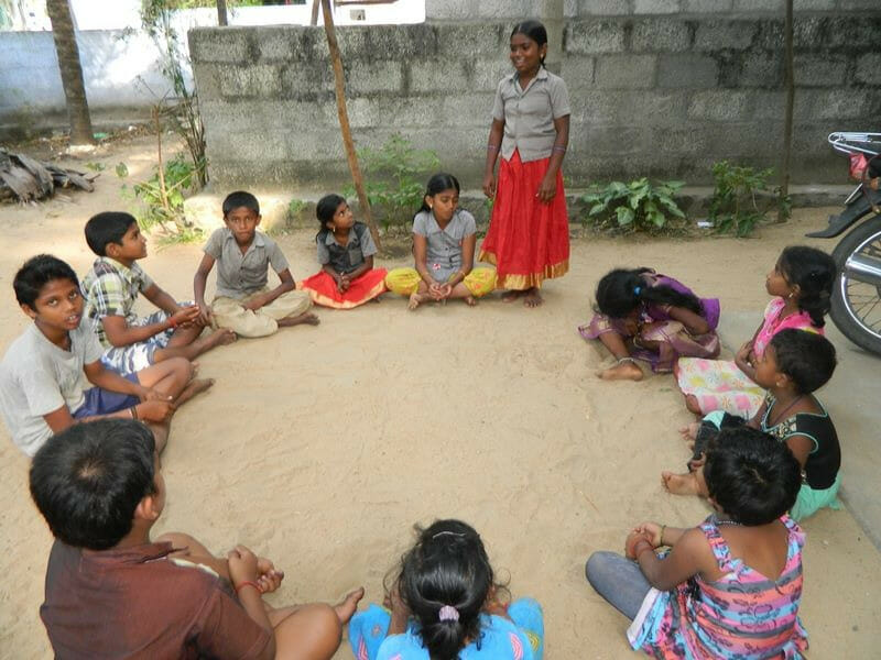 Children sitting in a circle